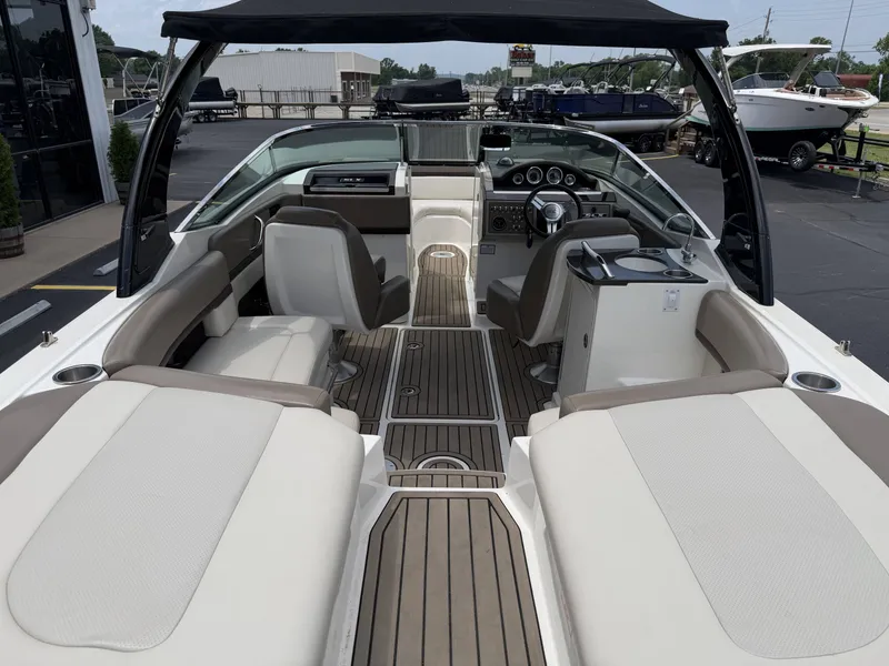 Slide: The Image of Interior of a 2013 Sea Ray 250SLX with luxurious features. - 8