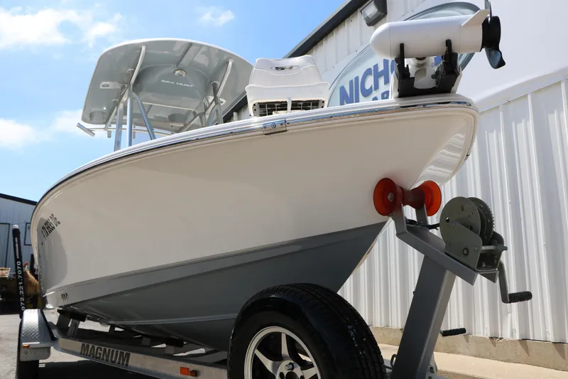 Slide: The Image of 2016 Sea Hunt BX 22 BR boat on trailer, parked outdoors. - 15