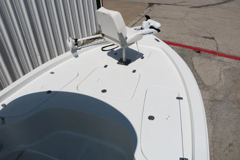 Slide: The Image of 2016 Sea Hunt BX 22 BR boat deck with mounted seat and trolling motor. - 24