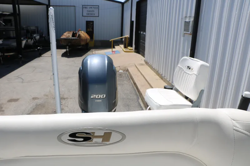 Slide: The Image of 2016 Sea Hunt BX 22 BR boat with Yamaha 200 engine at sales office. - 44