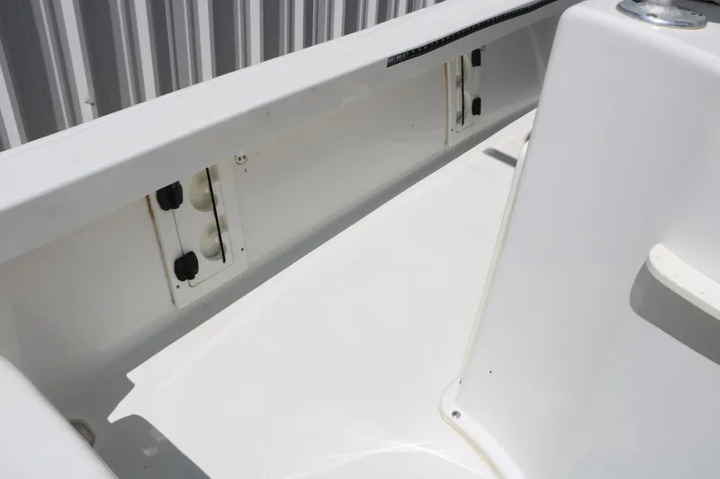 Slide: The Image of 2016 Sea Hunt BX 22 BR boat interior detail with storage compartments. - 51