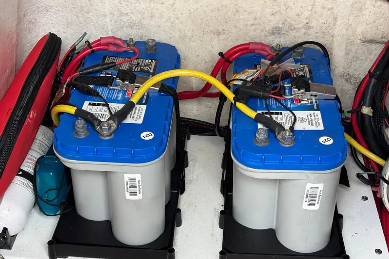Slide: The Image of Dual marine batteries in a 2004 Key West 2220 Center Console boat. - 15
