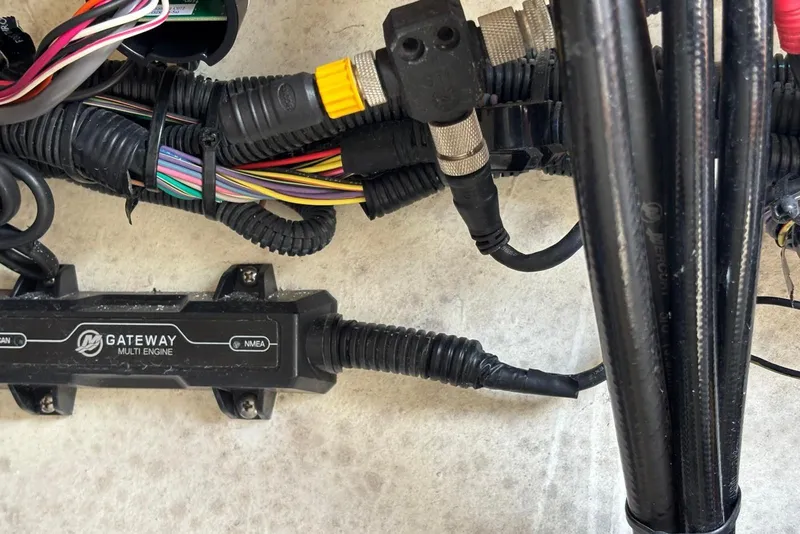 Slide: The Image of Wiring and connectors in a 2004 Key West 2220 Center Console boat. - 16