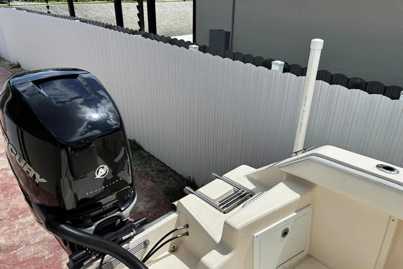 Slide: The Image of 2004 Key West 2220 Center Console boat with Mercury outboard engine. - 6