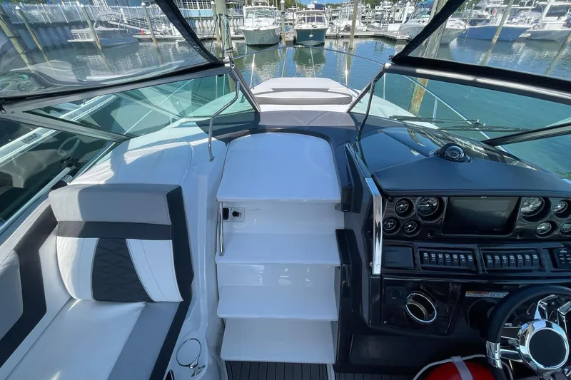 Slide: The Image of MOLDED FIBERGLASS STEPS TO THE BOW THROUGH THE WALK-THRU WINDSHIELD FOR ADDED SAFETY - 47