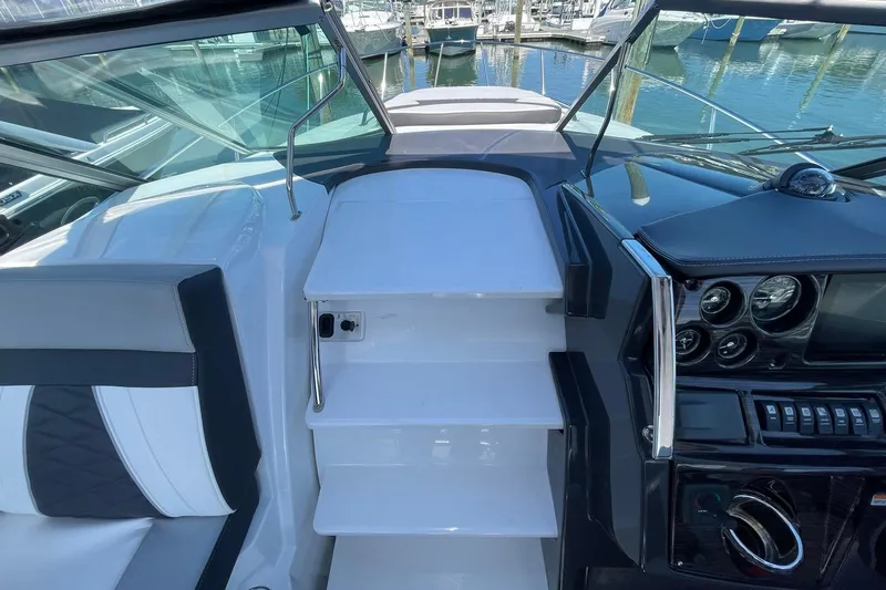 Slide: The Image of MOLDED FIBERGLASS CABIN ENTRY DOOR AND STEPS LEADING TO THE BOW DECK THRU THE WALK-THRU WINDSHIELD FOR ADDED SAFETY!! - 48