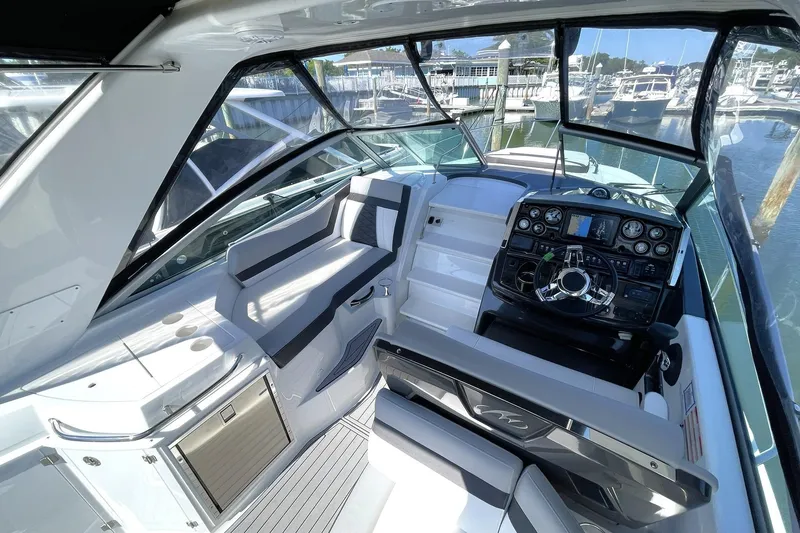 Slide: The Image of COCKPIT LOUNGE SEATING TO PORT ACORSS FROM THE HELM DECK - 49