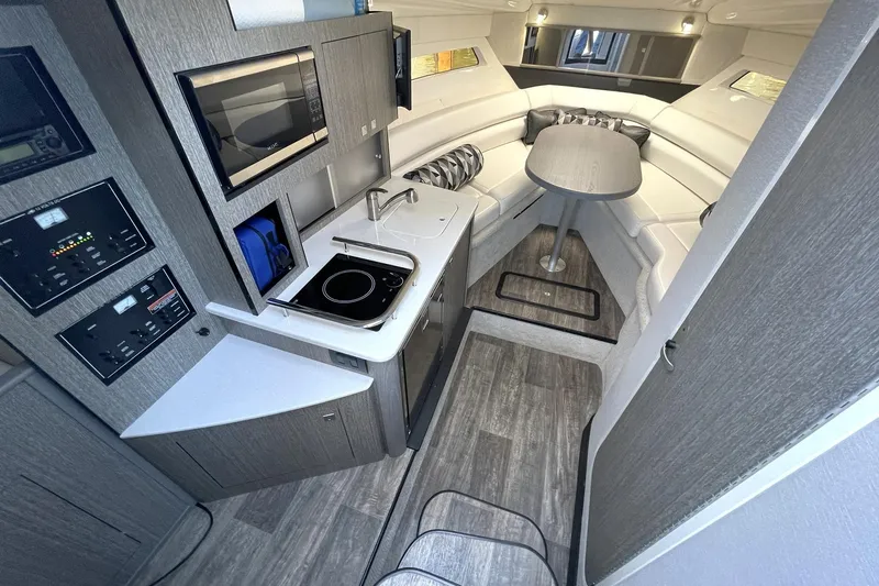 Slide: The Image of LUXURIOUS MODERN CABIN WITH FULL GALLEY, V-BERTH & LOUNGE AREA WITH TABLE, HEAD, AND AFT CABIN DOUBLE BERTH. - 8