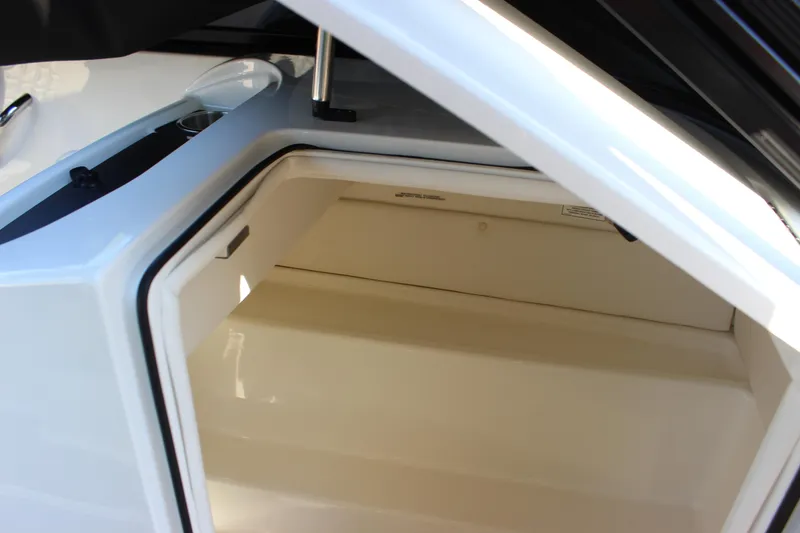 Slide: The Image of 2020 Bayliner VR6 Bowrider I/O storage compartment, open and spacious interior view. - 16