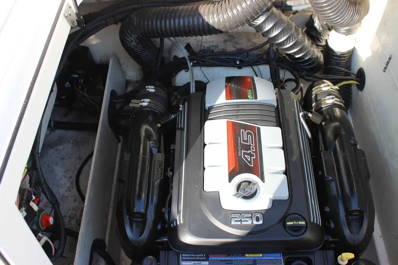 Slide: The Image of 2020 Bayliner VR6 Bowrider I/O engine compartment with MerCruiser 4.5L 250 HP engine. - 17