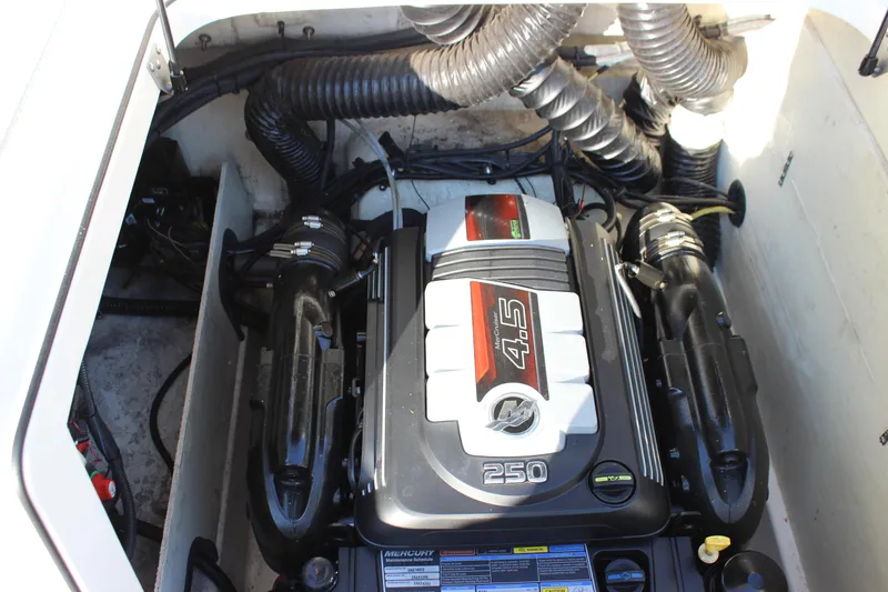 Slide: The Image of 2020 Bayliner VR6 Bowrider I/O engine compartment with Mercury 4.5L 250 HP engine. - 18