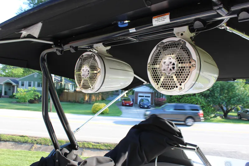Slide: The Image of 2020 Bayliner VR6 Bowrider I/O with mounted marine speakers under canopy. - 19