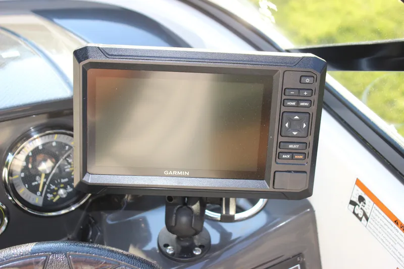 Slide: The Image of Garmin navigation system on 2020 Bayliner VR6 Bowrider I/O dashboard, featuring control buttons. - 23
