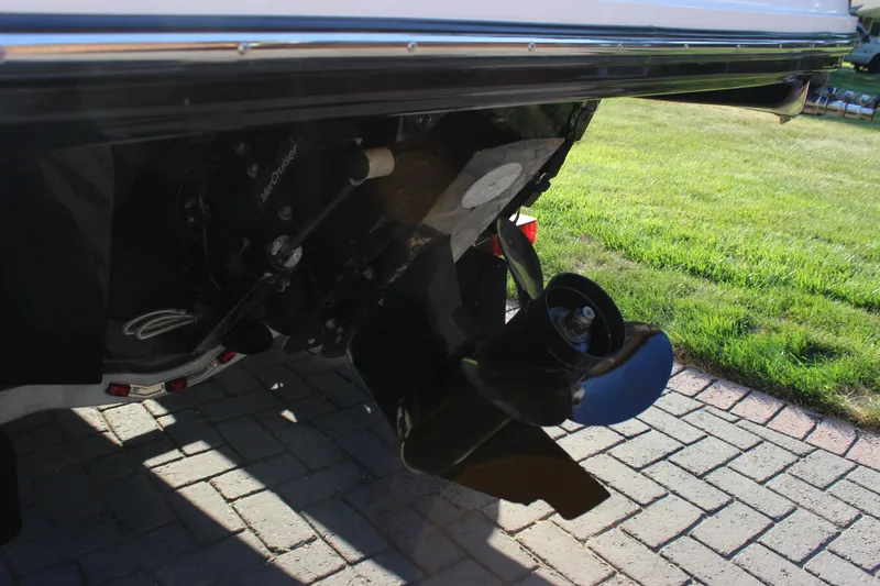 Slide: The Image of 2020 Bayliner VR6 Bowrider I/O boat stern drive and propeller detail. - 7