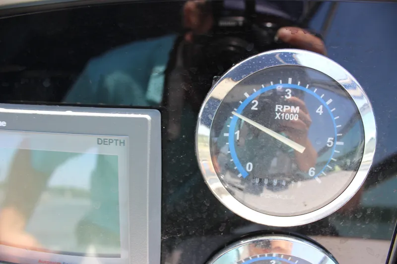 Slide: The Image of Close-up of 2005 Formula 31 Performance Cruiser RPM gauge and depth display. - 20