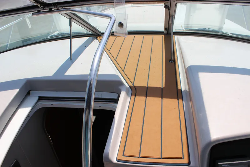 Slide: The Image of 2005 Formula 31 Performance Cruiser cockpit with teak flooring and open hatch. - 22