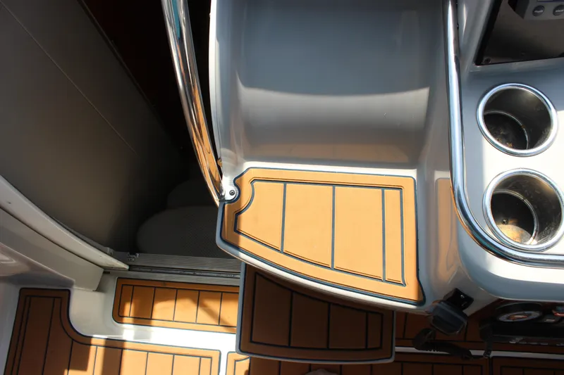 Slide: The Image of 2005 Formula 31 Performance Cruiser interior with teak flooring and stainless steel cup holders. - 23