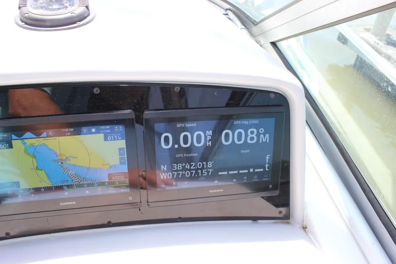 Slide: The Image of Dashboard of a 2005 Formula 31 Performance Cruiser with Garmin GPS displays. - 40