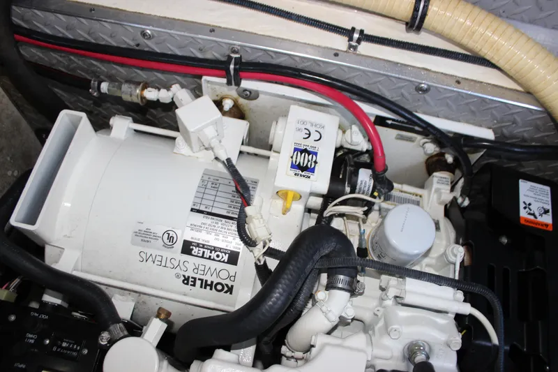 Slide: The Image of Engine compartment of a 2005 Formula 31 Performance Cruiser with Kohler power systems. - 45