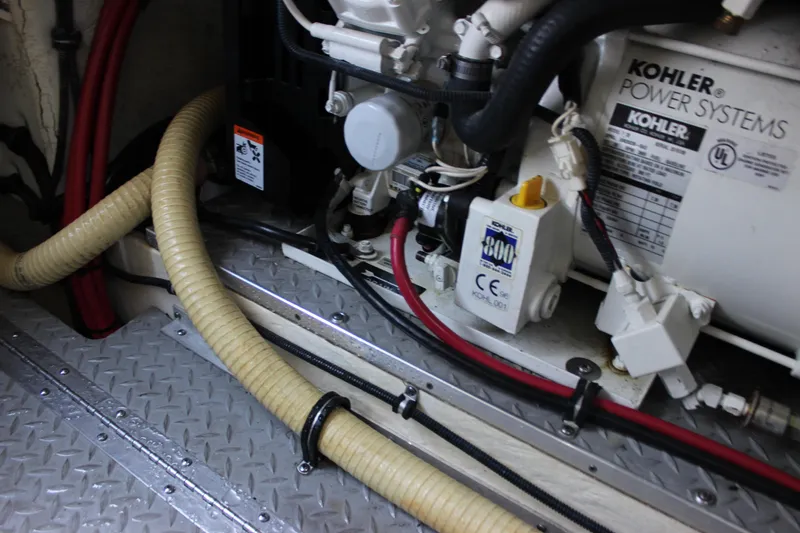 Slide: The Image of Engine compartment of a 2005 Formula 31 Performance Cruiser with Kohler power system. - 46