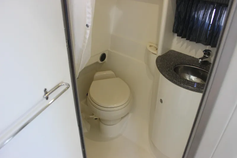 Slide: The Image of Bathroom interior of 2005 Formula 31 Performance Cruiser with toilet and sink. - 56