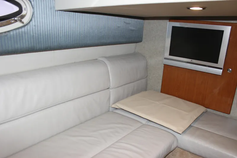Slide: The Image of Interior of 2005 Formula 31 Performance Cruiser with leather seating and wall-mounted TV. - 58