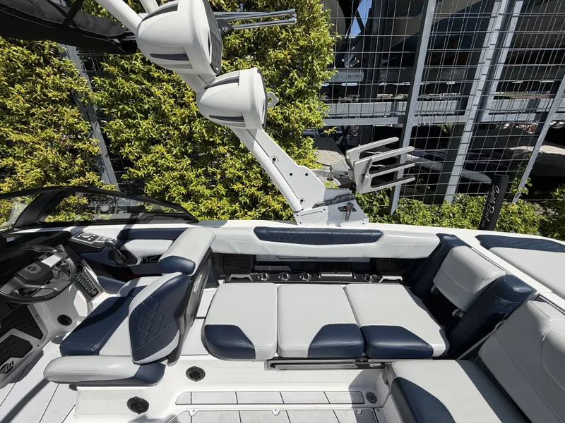Slide: The Image of Interior of a 2022 Malibu M220 boat with luxurious seating. - 10