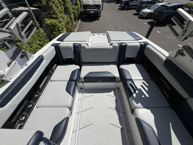 Slide: The Image of Interior of 2022 Malibu M220 boat with luxurious seating. - 11