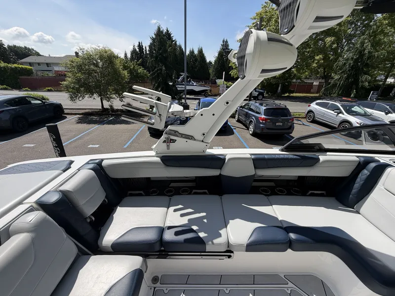 Slide: The Image of Interior of a 2022 Malibu M220 boat with luxurious seating. - 12