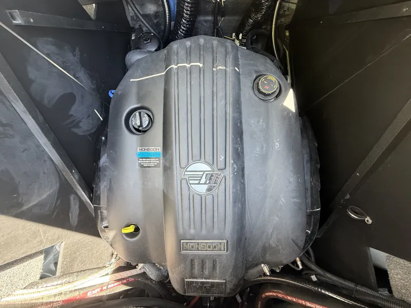 Slide: The Image of Engine of 2022 Malibu M220 with Monsoon logo. - 18