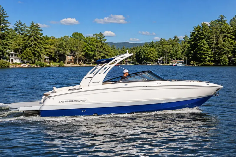 The Image of Chaparral SSX 6 2026 boat cruising on a serene lake. - 1