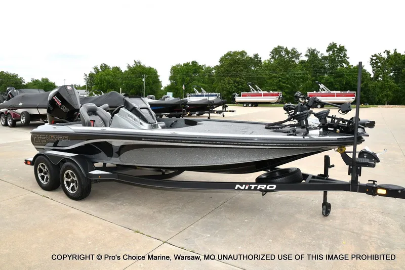 The Image of 2020 Nitro Z19 Pro boat on trailer outdoors. - 1