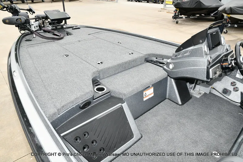 Slide: The Image of Interior of a 2020 Nitro Z19 Pro boat with gray carpeting. - 14