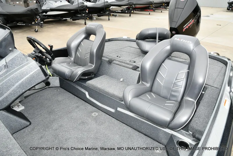 Slide: The Image of Interior of a 2020 Nitro Z19 Pro boat with gray leather seats. - 16
