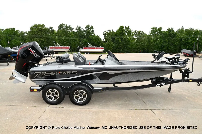 Slide: The Image of 2020 Nitro Z19 Pro boat parked on trailer outdoors. - 19