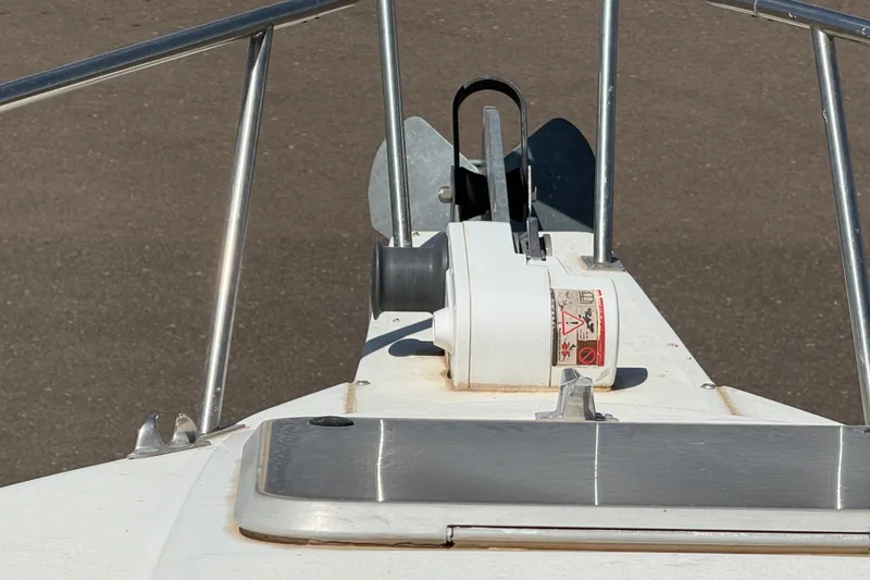 Slide: The Image of Bow of 1988 Cruisers Yachts 2470 Holiday with anchor and winch system. - 25