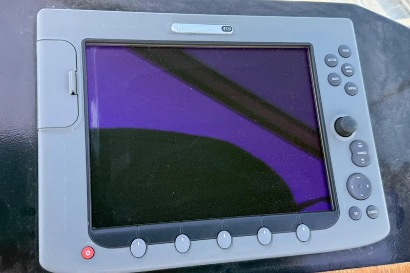 Slide: The Image of Raymarine E120 marine display on 1988 Cruisers Yachts 2470 Holiday. - 28