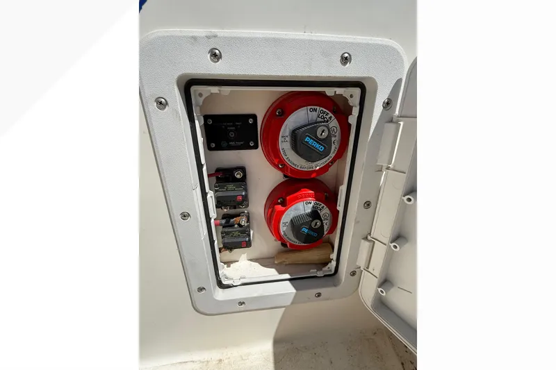 Slide: The Image of Electrical panel with switches on a 1988 Cruisers Yachts 2470 Holiday boat. - 29