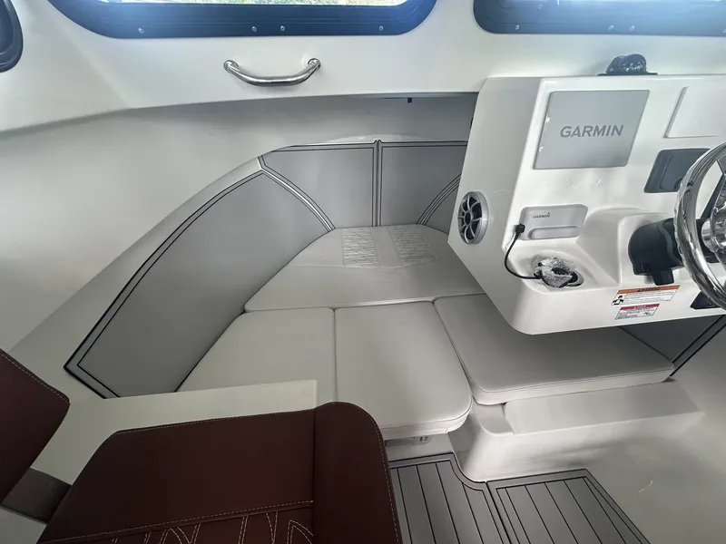 Slide: The Image of Interior of 2026 Parker 247 Explorer with Garmin controls. - 10