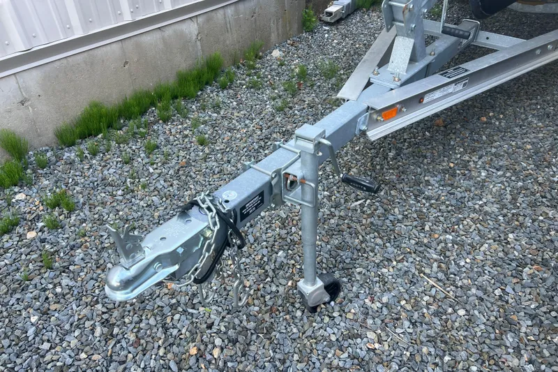 Slide: The Image of Trailer hitch of a 2023 Inmar 600R-PT on gravel surface. - 29