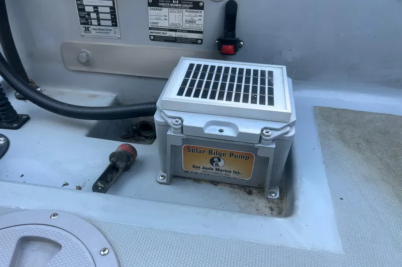 Slide: The Image of Solar bilge pump on 2023 Inmar 600R-PT boat deck, featuring Sea Joule Marine Inc. branding. - 8