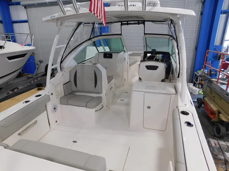 Slide: The Image of Interior of a 2022 Pursuit DC 266 Dual Console boat. - 12