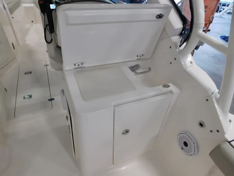 Slide: The Image of Interior of 2022 Pursuit DC 266 Dual Console with helm area. - 17
