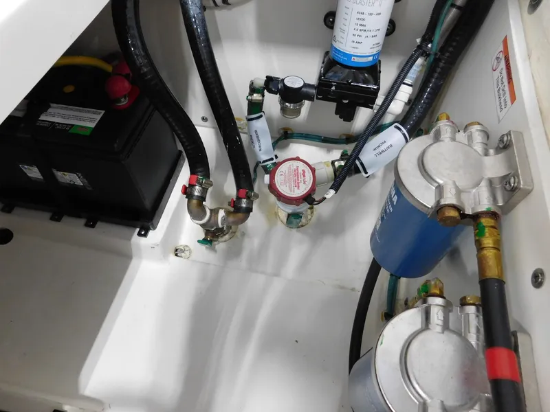 Slide: The Image of Interior view of Pursuit DC 266 Dual Console 2022 engine compartment. - 21