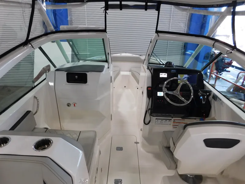 Slide: The Image of Interior view of 2022 Pursuit DC 266 Dual Console boat. - 24