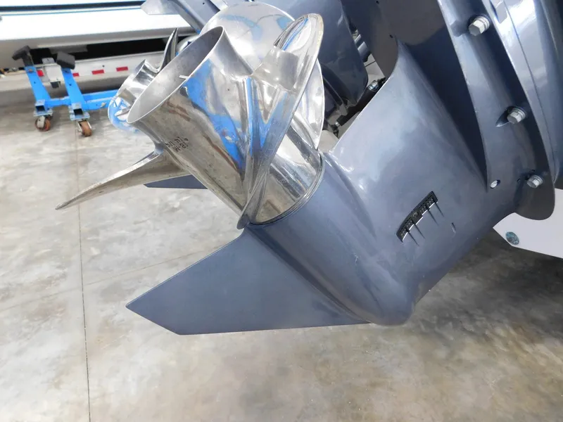 Slide: The Image of Close-up of a 2022 Pursuit DC 266 Dual Console boat propeller. - 8