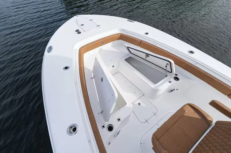 Slide: The Image of Sea Hunt Ultra 285 SE 2026, spacious deck design on the water. - 16