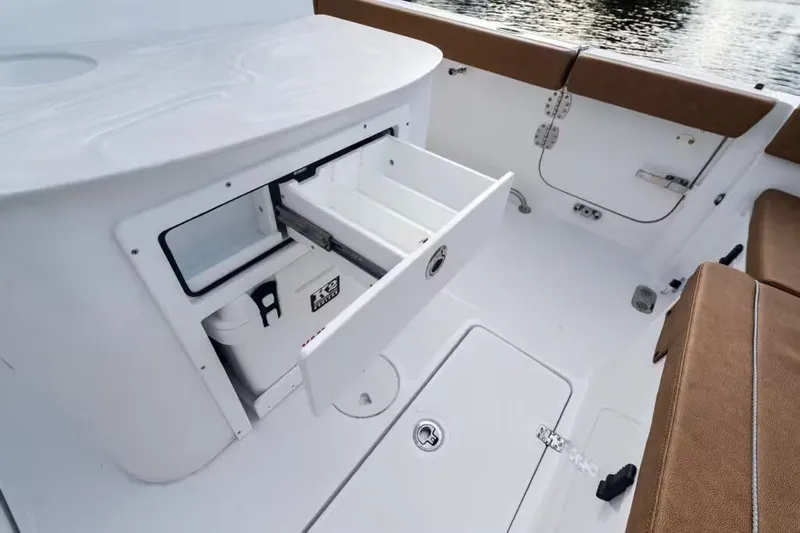 Slide: The Image of Interior view of Sea Hunt Ultra 285 SE 2026 with storage. - 7