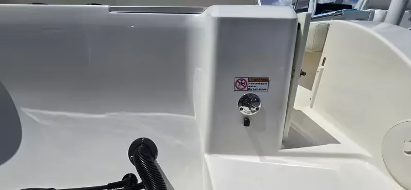 Slide: The Image of Cobia 220 Dual Console 2020, boat shower and fixtures. - 8