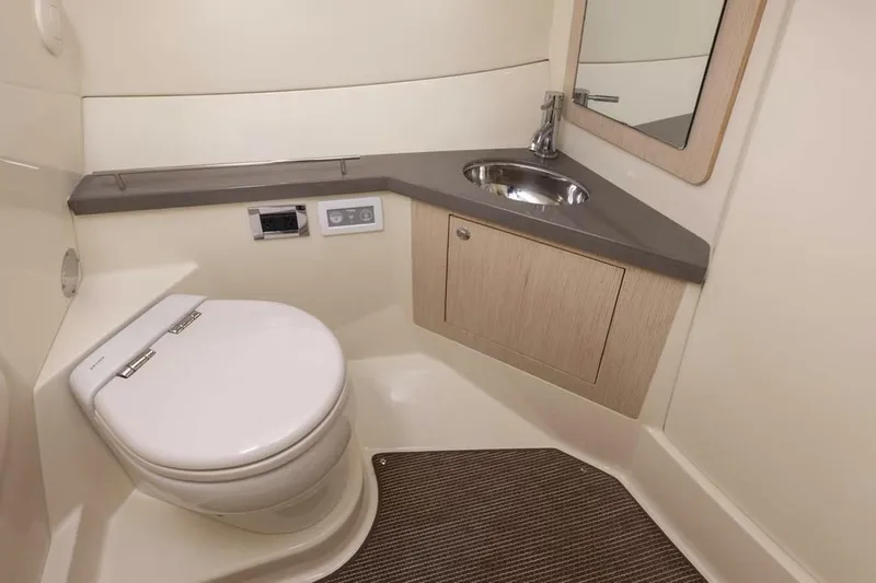 Slide: The Image of Manufacturer Provided Image: Luxurious bathroom in 2025 Chris-Craft Calypso 32 boat with modern fixtures and sleek design. - 10